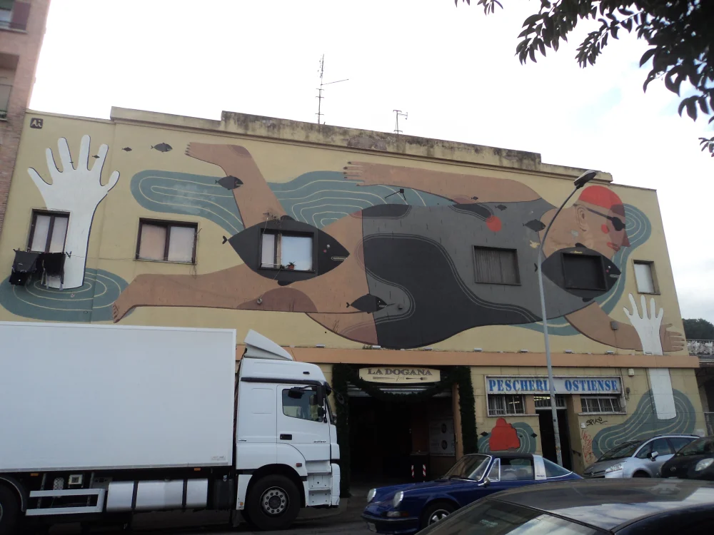 Rue et façades street art dans le quartier d'Ostiense, Rome